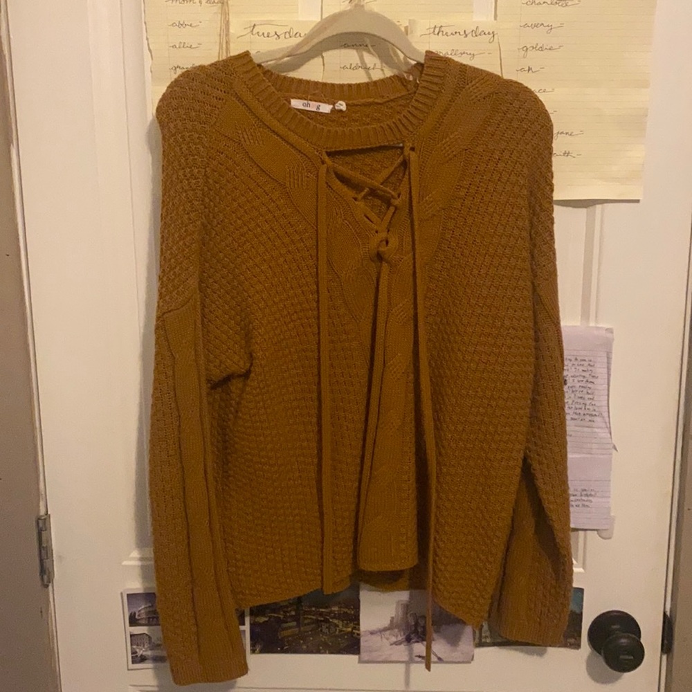 Women’s burnt orange lace up ohmg sweater